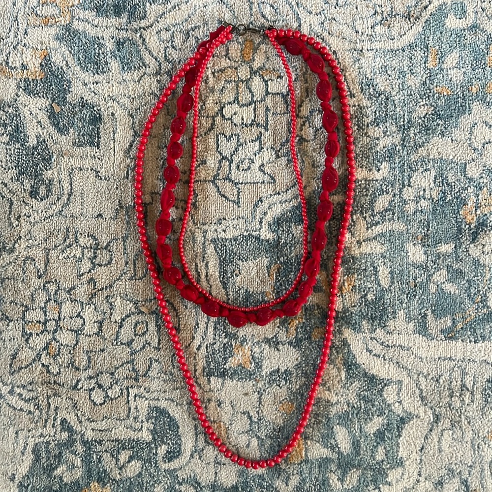 Red beaded tri-layer necklace. 12” shortest, 20” longest length. Multi textured